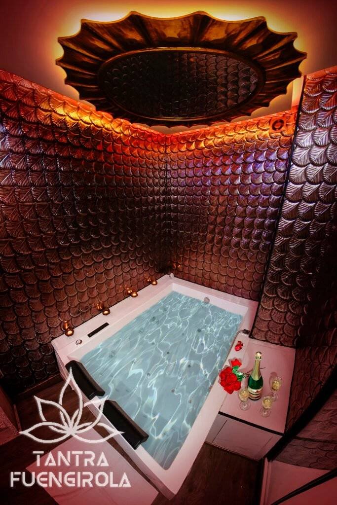 Private Jacuzzi massage room with copper tiled walls in Fuengirola