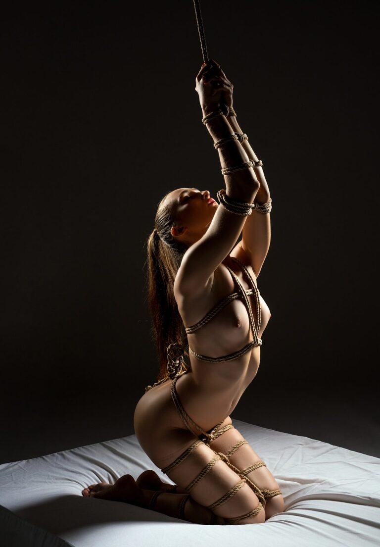 Kneeling Shibari tie with suspension line at Tantra Fuengirola